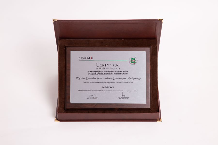 Certificate in a wooden frame and in a wooden brown box