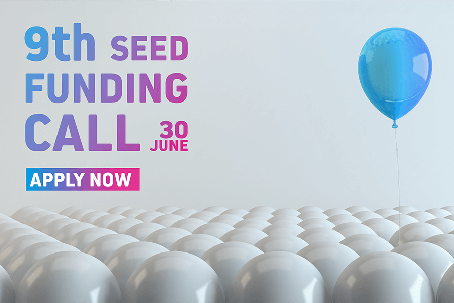 Plakat 9th Seed Funding Call: leżące białe piłeczki i jeden niebieski balonik nad nimi
