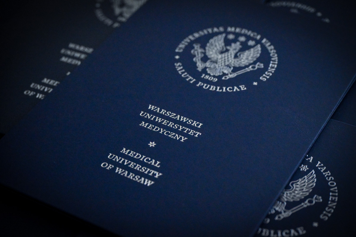 Dark blue cover of the document with the inscription “Warsaw Medical University”