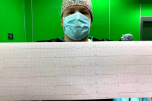 Dr. Piotr Wieniawski with an electrocardiogram