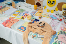 Stand with Korean trinkets (socks, stickers, mascots)