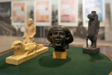 Four Egyptian figures.