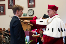 The rector accepts the young man as a student. 