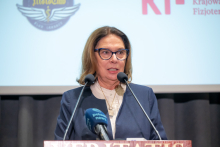 Małgorzata Kidawa-Błońska, Marshal of the Senate, stands at the podium and speaks during the conference.