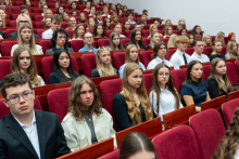 Students gathered in the auditorium attend the inauguration of the academic year.