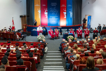 A general view of the auditorium during the inauguration of the academic year, attended by university authorities, guests, and members of the audience.