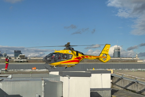 A helicopter on a helipad.